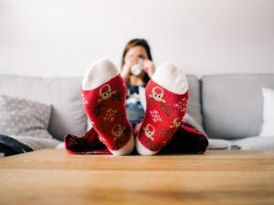 Woman with feet on table