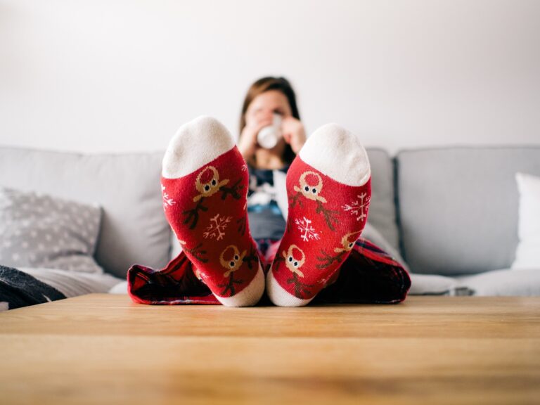 Woman with feet on table