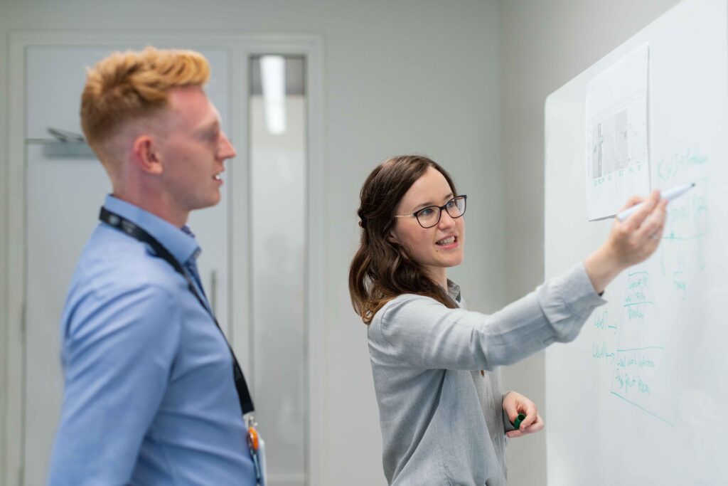 Woman explaining in office