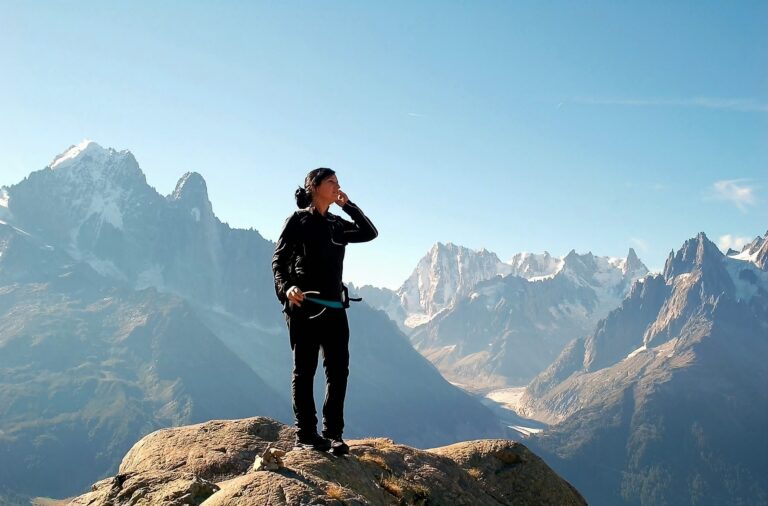 Woman at top of mountain