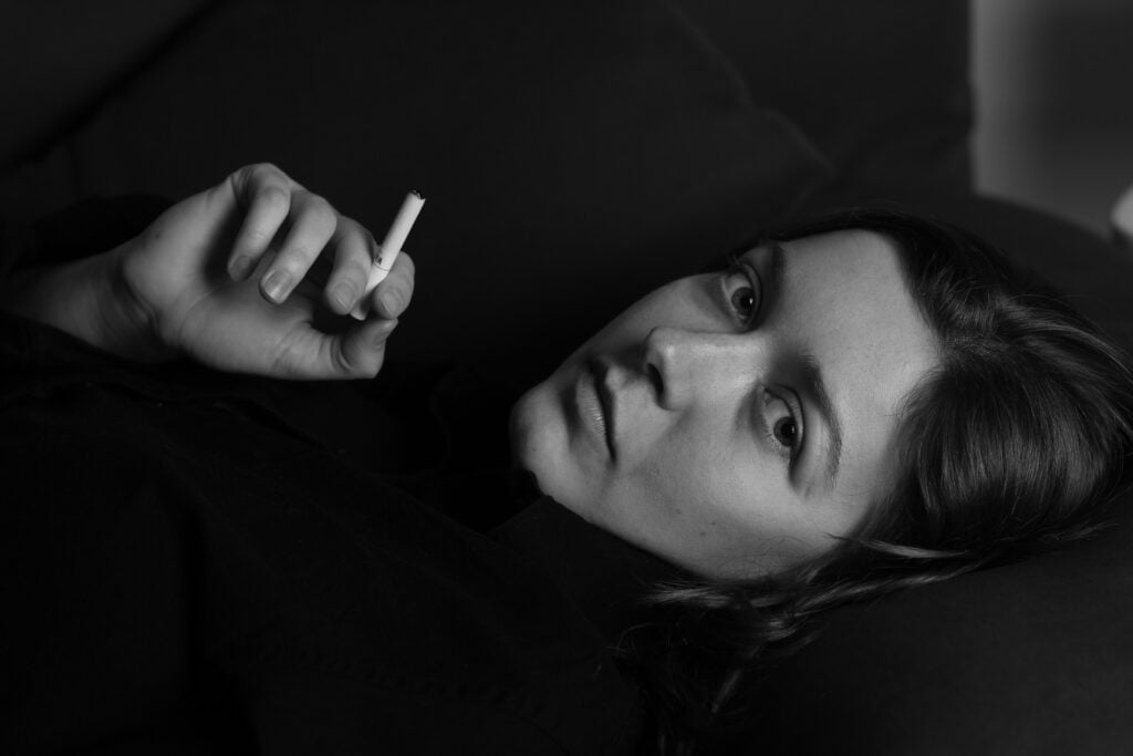 Woman holding cigarette