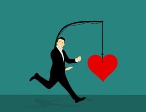 Man chasing heart that's always away